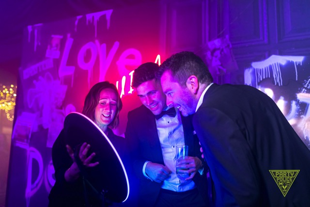 Roaming photo booth capturing guests on the dance floor